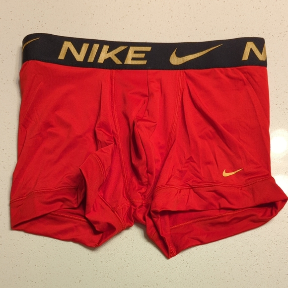 Nike Other - Nike Red Trunks with Gold Logo